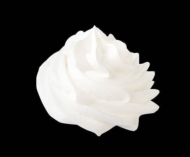 istock Whipped cream isolated on a black background with clipping path 585605654