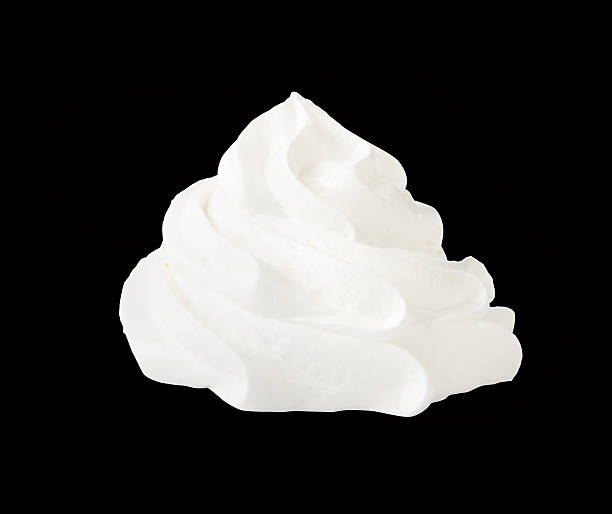 istock Whipped cream isolated on a black background with clipping path 585605668