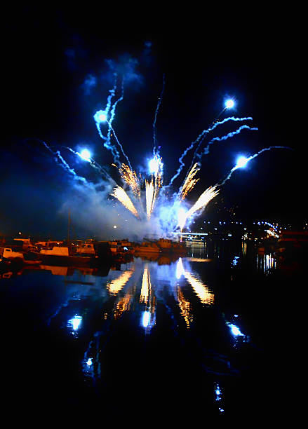 istock fireworks over the water surface in the marina 585605912
