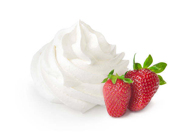 istock White whipped cream isolated on a  background with strawberries.  clipping 585606028