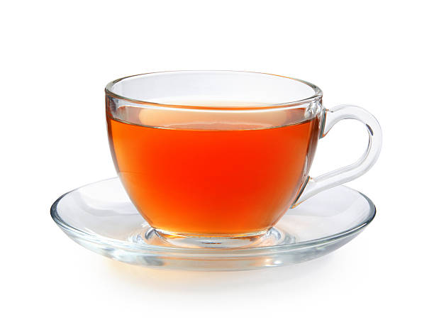 istock Glass cup of tea isolated on a white background with 585606434