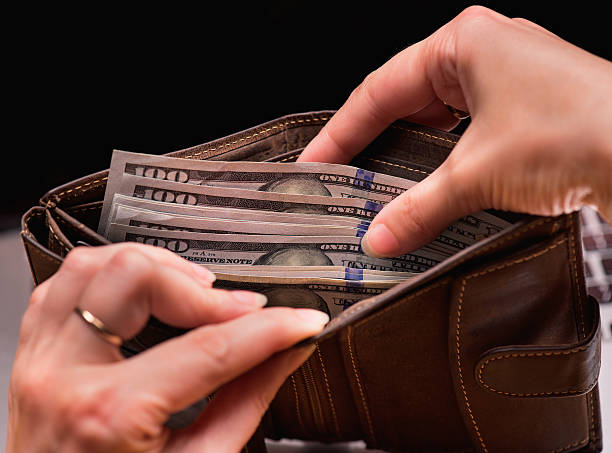 istock Woman accountant with money 585606436
