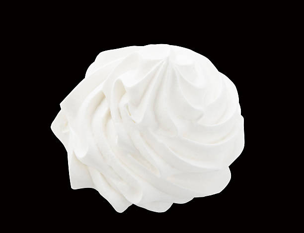 istock Whipped cream isolated on a black background with clipping path 585606466