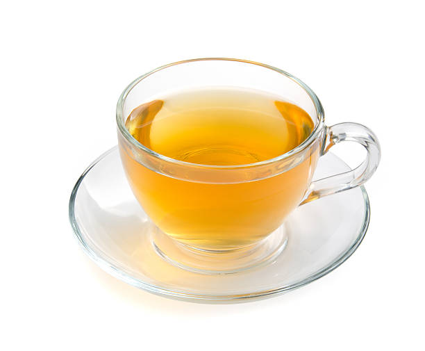 istock Glass cup of tea isolated on a white background with 585607726