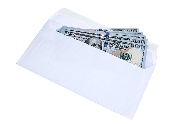Hundred dollar bills in the envelop isolated on white background stock photo