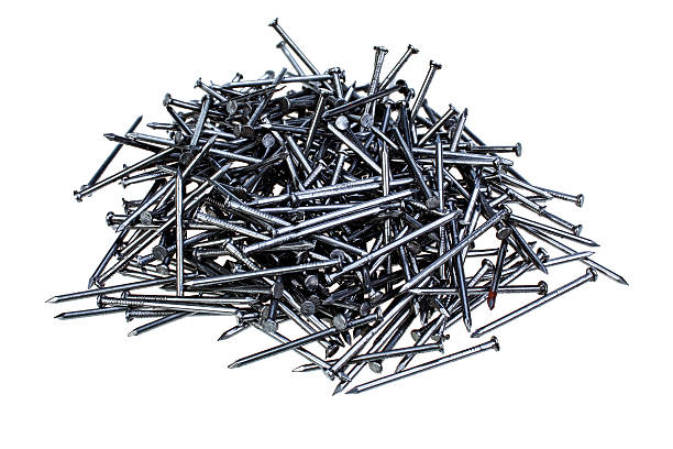 Pile of new nails isolated on white background stock photo