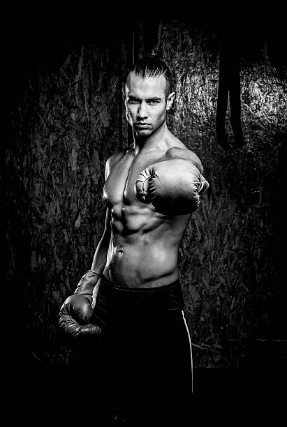 istock Young muscular man in gym 585611026