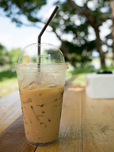 istock ice coffee on wooden in the garden 585611224