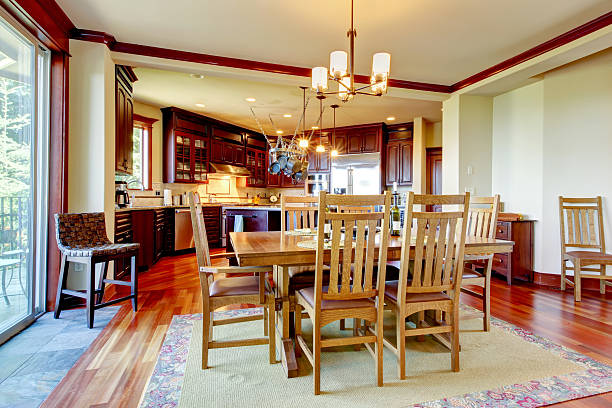 istock View of dining table set with kitchen in the background. 585612020