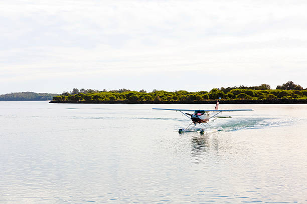 Seaplane landing at Port Macquarie Australia, full frame horizontal composition with copy space