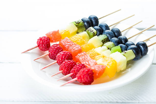 istock Fresh summer fruits on sticks 585613252