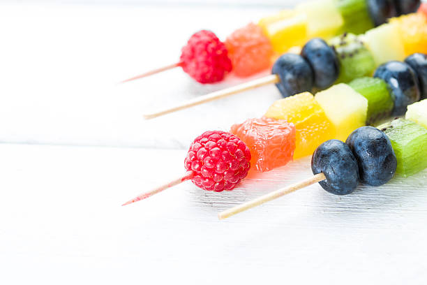 istock Fresh summer fruits on sticks 585613270