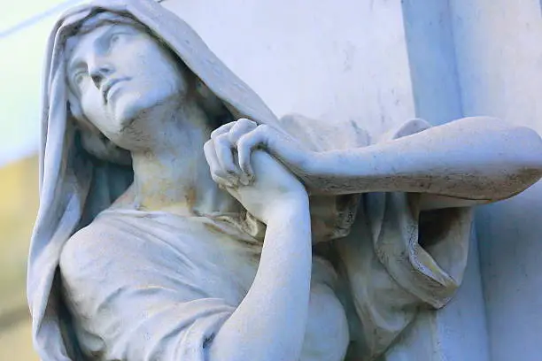 Photo of Religion hope: Pensive Madonna praying hands clasped, Recoleta cemetery