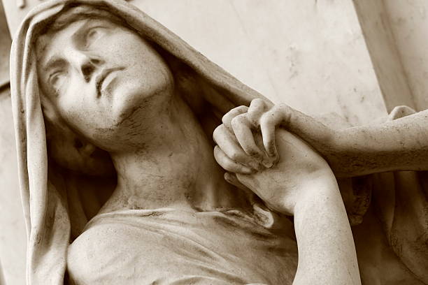 Religion hope: Sepia Madonna praying hands looking to sky, Recoleta Religion hope: Madonna praying hands, Recoleta cemetery, Buenos Aires, South America sistine madonna stock pictures, royalty-free photos & images