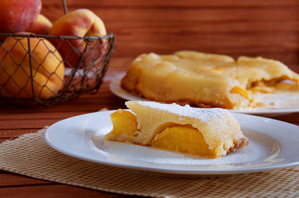 istock Peach caramel turnover pie sprinkled with sugar powder 585614718