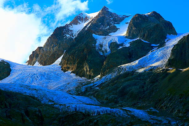 istock Alpine landscape, Mont Blanc Massif ice glacier rock face alps 585618090