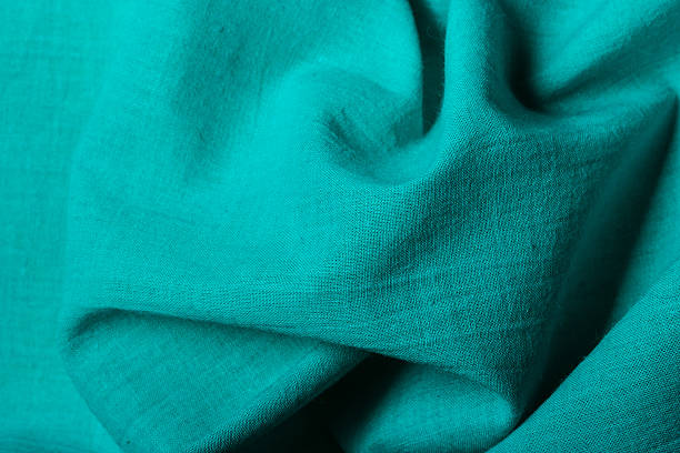 istock Blue background abstract wavy folds cloth 585618856