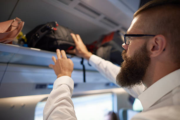istock Man taking the backpack on the end travel 585622622