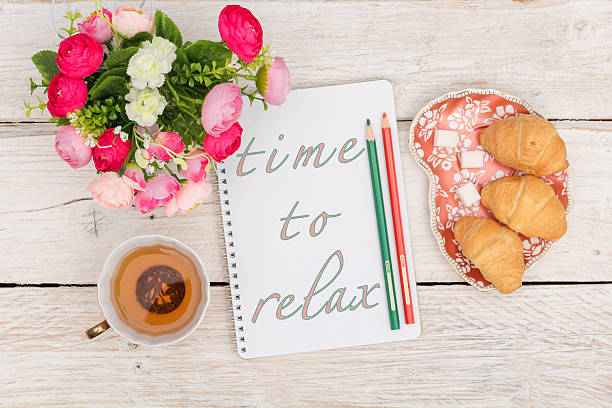 istock Breakfast and an inscription in a notepad: Time to relax 585623546