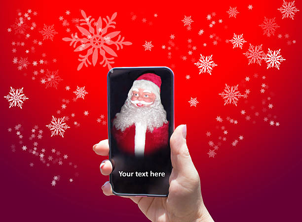 istock The Santa Claus in smart phone on red background 585624064