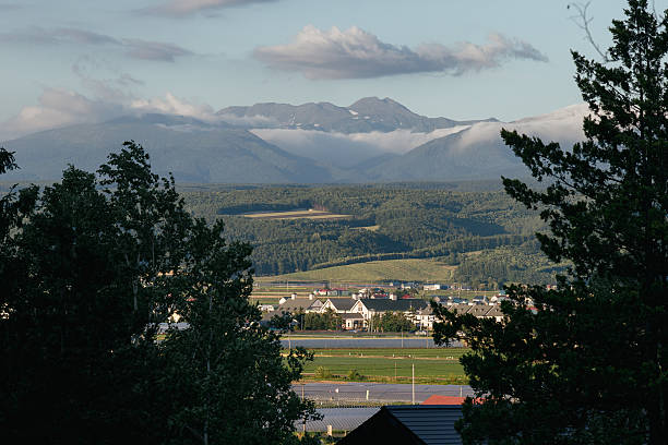 istock Long line mountain Village and Blue sky 585624200