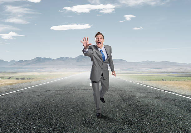 istock Emotional running businessman . Mixed media 585625216