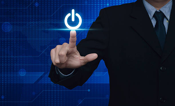 istock Pressing power button, Elements of this image furnished by NASA 585627170