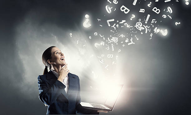 istock Woman with laptop in hands . Mixed media 585627508