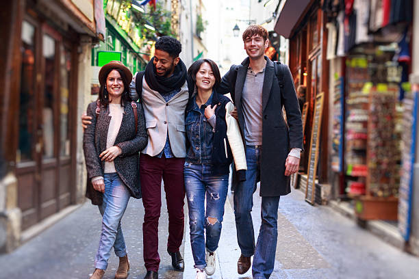 istock Multi-ethnic group of friends having fun in Paris, Quartier Latin 585628578