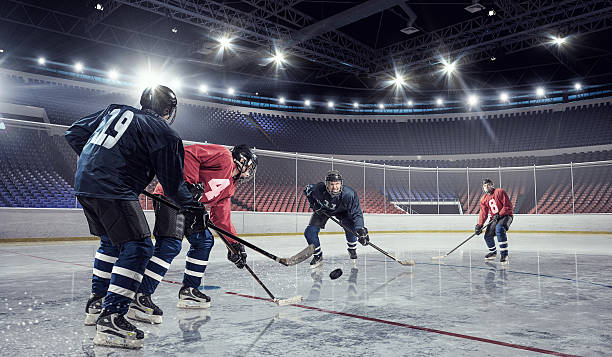 istock Hockey match at rink  . Mixed media 585629606