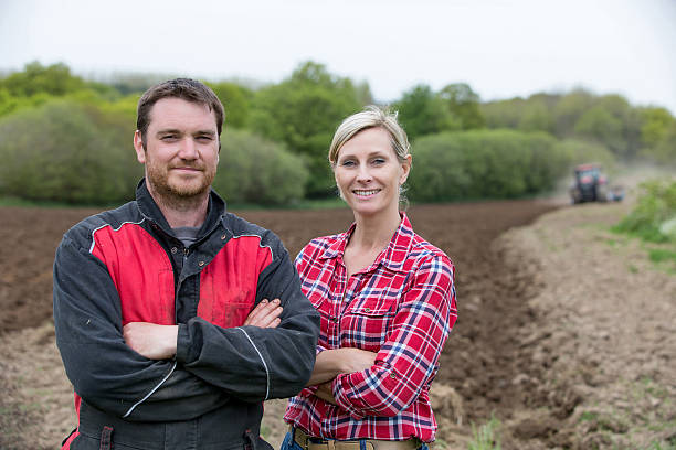 couple of farmers couple of farmers the farmer and his wife pictures stock pictures, royalty-free photos & images