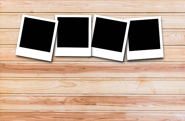 istock collection of frame on wood background 585765452