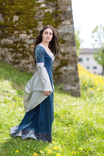 Medieval dress on young girl model with black hair