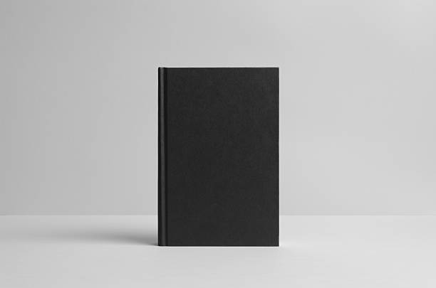 istock Black Hardcover Book Mock-Up - Front. Wall Background 585769212