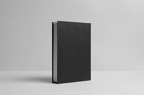 istock Black Hardcover Book Mock-Up - Backside. Wall Background 585769272