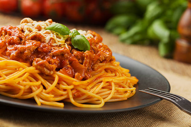 istock Delicious spaghetti served on a black plate 585769572
