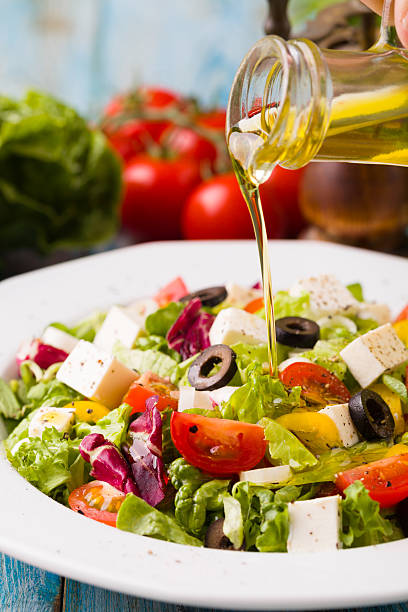 istock Fresh Greek salad on a plate 585769626