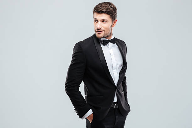 istock Attractive young man in tuxedo and bowtie 585771560