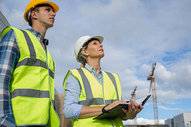 istock Portrait of builder works at construction site 585771832