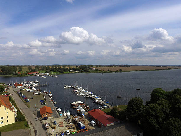 istock Aerial view Kirchdorf with small harbor on the island poel 585772884