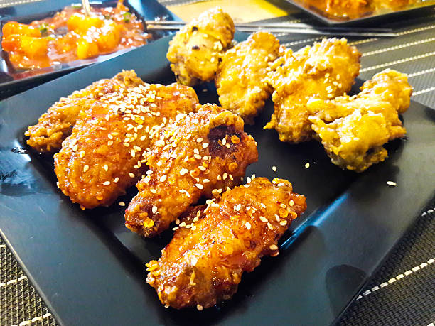 istock Korean fusion style deep fried chicken wings 585772984