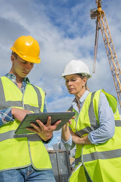 istock business, building, paperwork and people concept 585773054