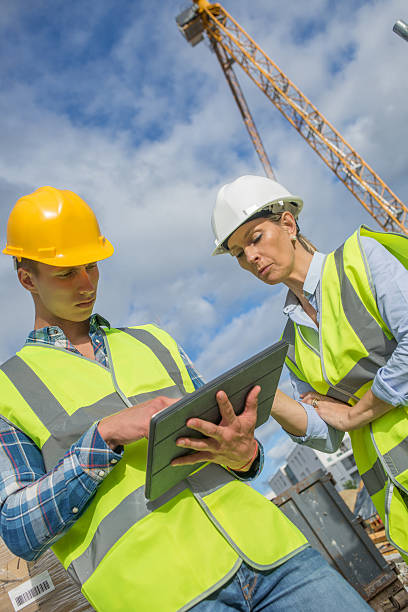 istock business, building, paperwork and people concept 585773164
