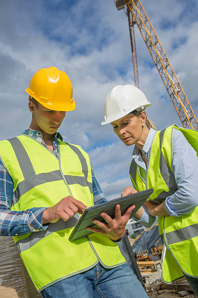 istock business, building, paperwork and people concept 585773246