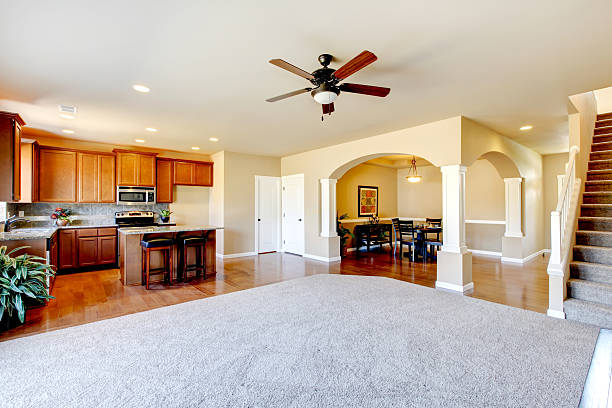istock Open floor plan. View of kitchen, dining room and entryway. 585774132