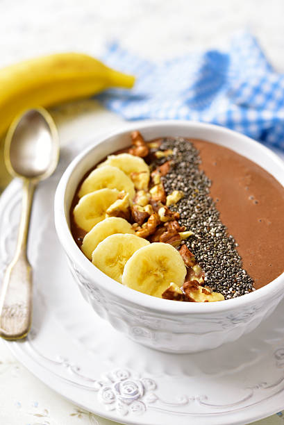 istock Chocolate banana smoothie with walnuts and chia seed. 585774328