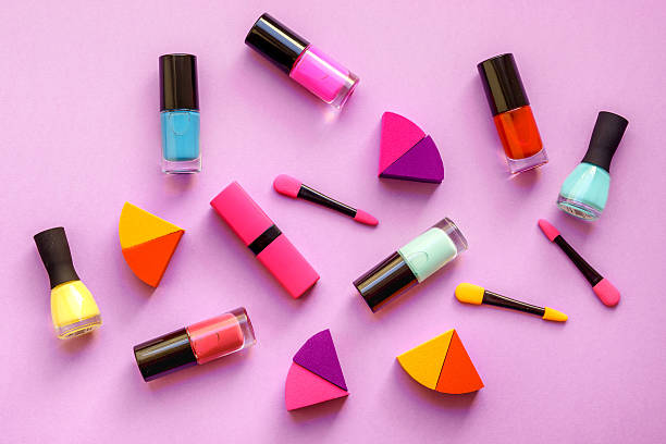 istock concept cosmetic set on pink background top view 585774764