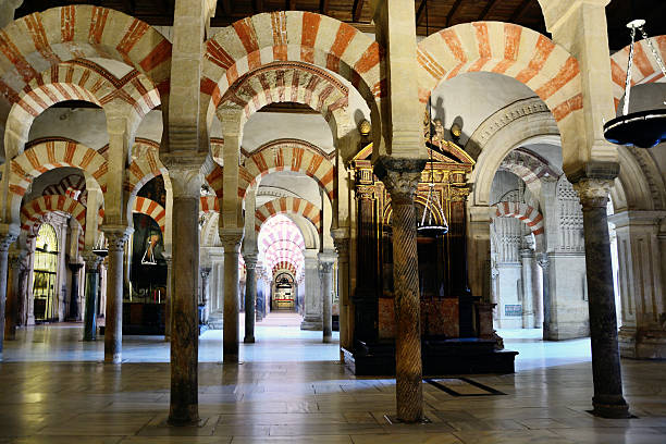 Moorish style arches in interior of the Mosque Cathedral of Cardoba, Spain