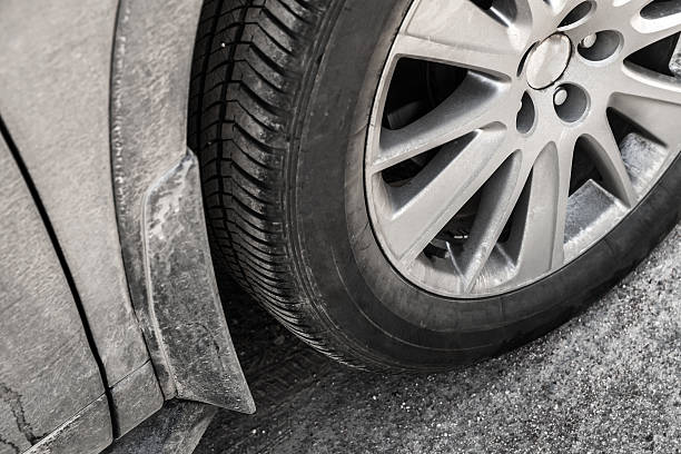 istock Car wheel with dirt on country road 585778214