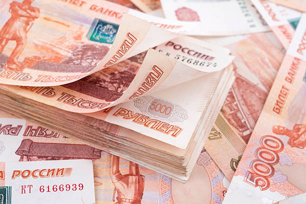 istock Heap of five thousand russian rubles banknotes 585779216